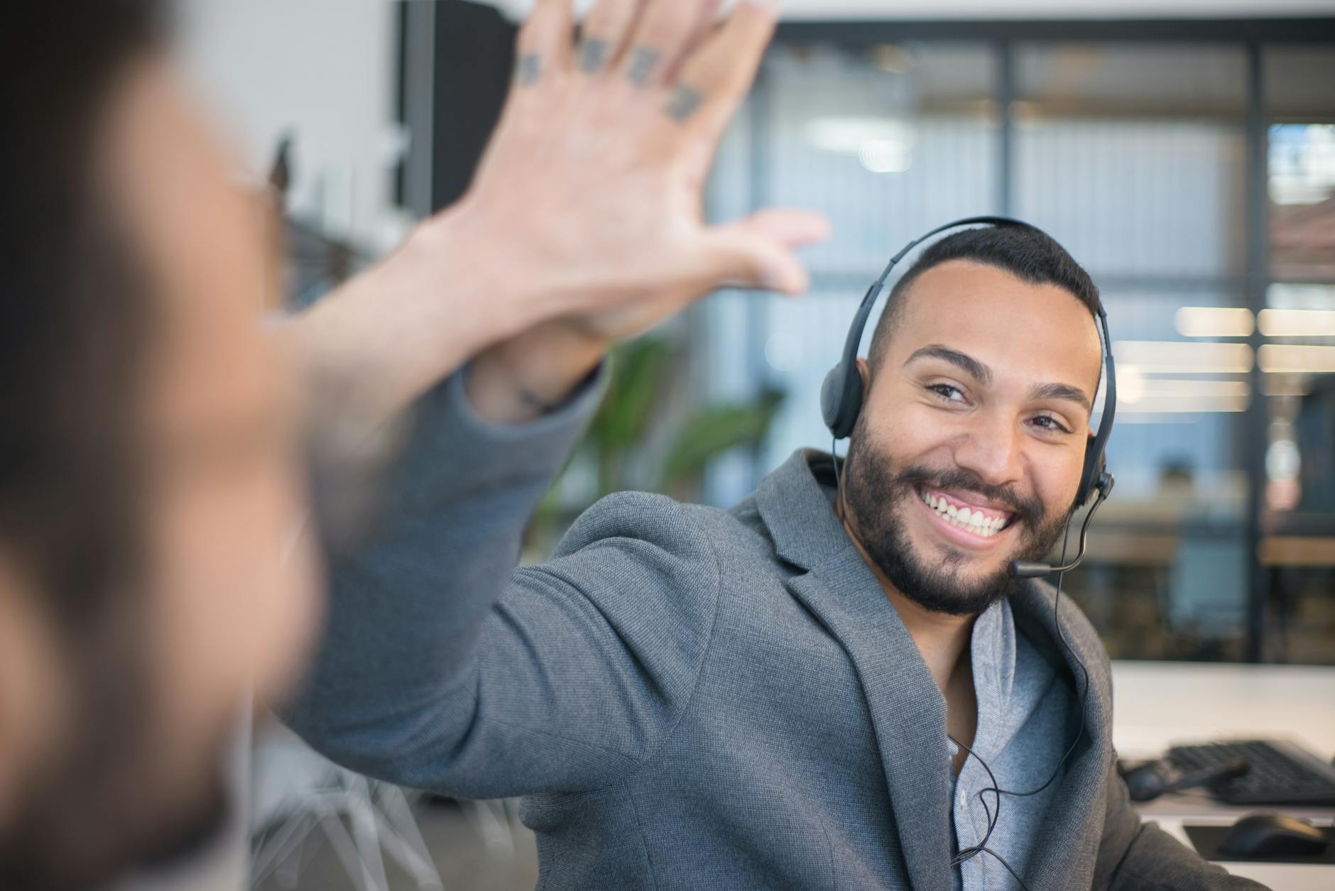 Customer success team high-five